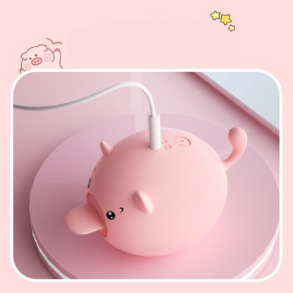 Sweet Pig estimulador oral cargando via USB