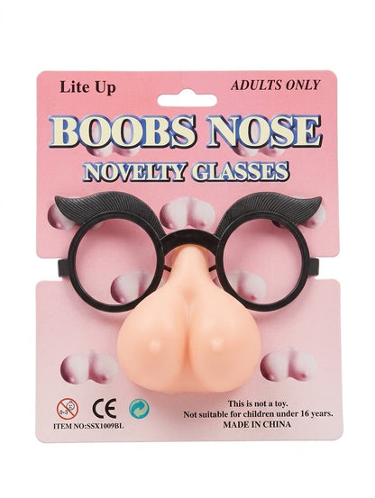 Gafas de broma de armazón negro, cejas y nariz decorativa sobre su empaque